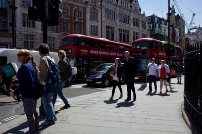 People walking on city street