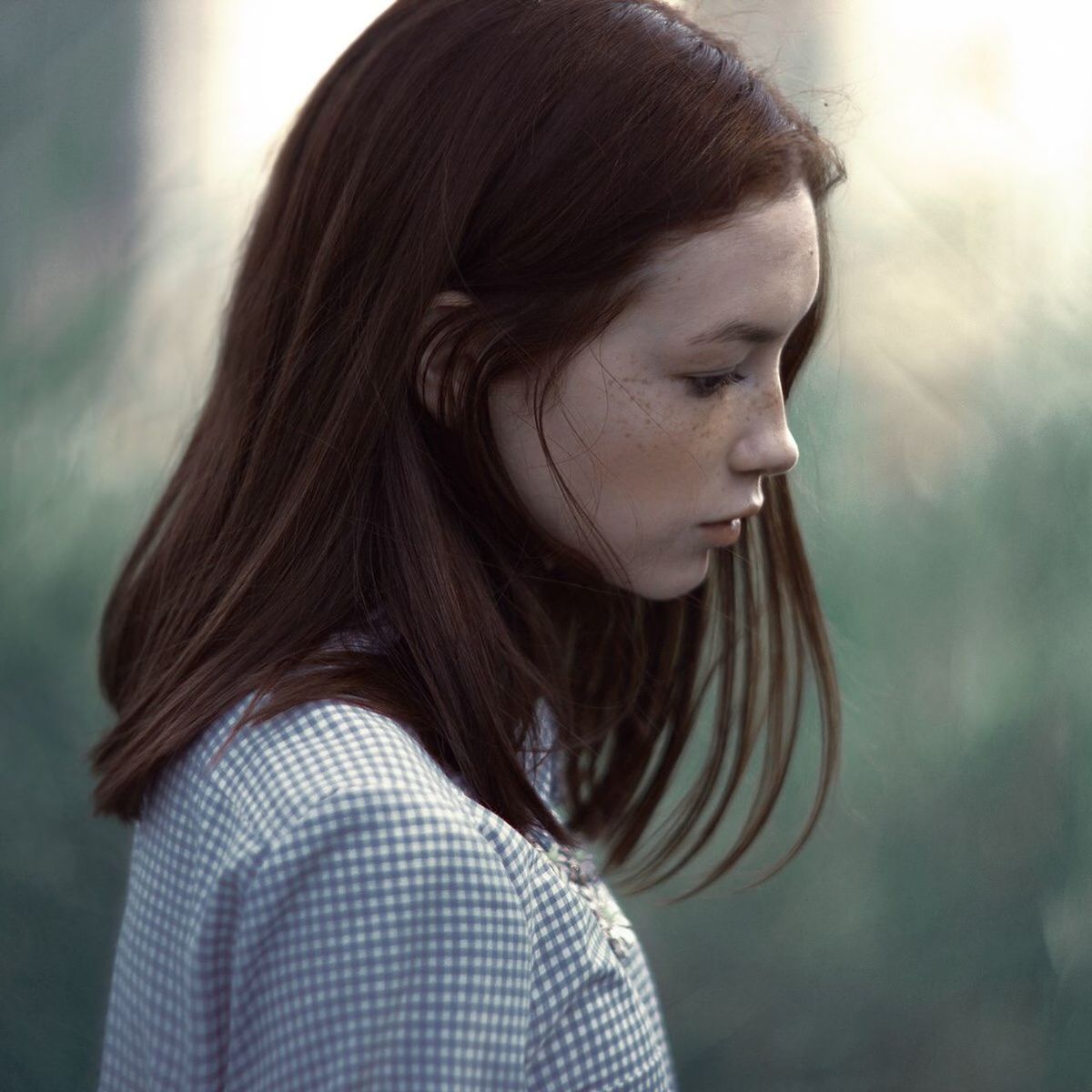 headshot, person, young adult, lifestyles, focus on foreground, young women, front view, contemplation, close-up, portrait, long hair, leisure activity, casual clothing, looking at camera, human face, serious