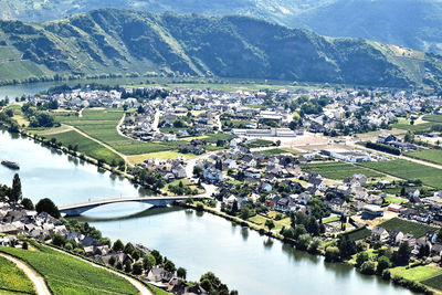 High angle view of river amidst buildings in town