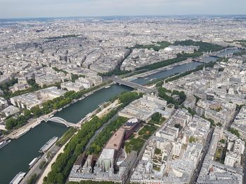 High angle view of river amidst buildings in city