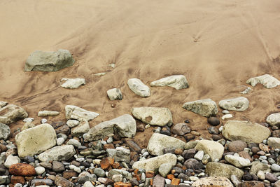 High angle view of stones on beach