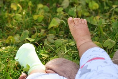 Low section of person on grass