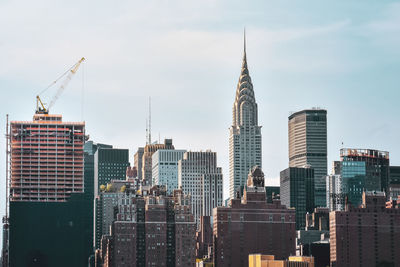 Office buildings and apartments on the skyline at sunset. manhattan, new york city, usa.