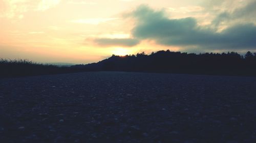 Scenic view of silhouette landscape against sky during sunset