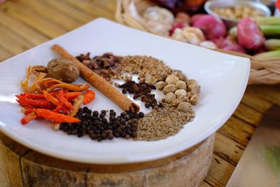 High angle view of chopped fruits in bowl on table