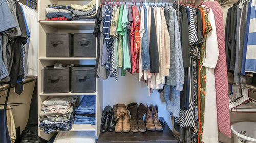 Clothes hanging in store for sale at market stall