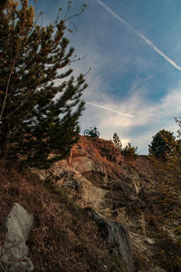 Low angle view of rocks against sky