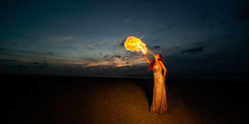 Fire breathing with donia serena on the beach