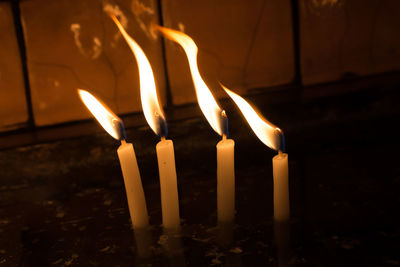 Close-up of burning candle