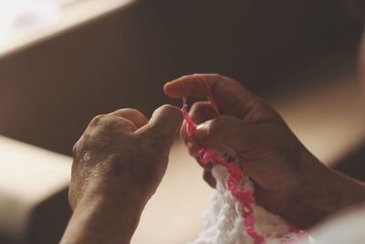 Close-up of hand holding hands