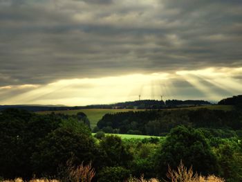 Scenic view of landscape against sky during sunset