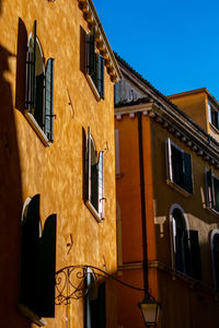 Low angle view of residential buildings against sky