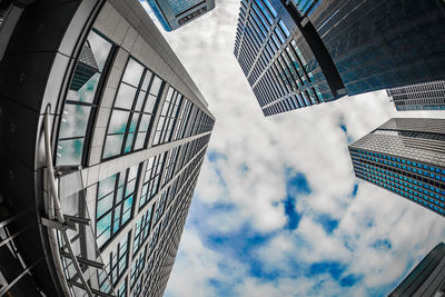 Low angle view of modern buildings against sky