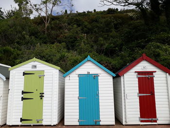 A row of colourful beach huts in paignton, devon.