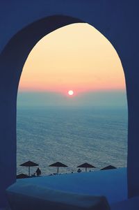 Scenic view of sea against clear sky during sunset