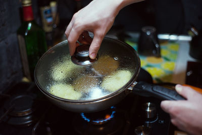 Close-up of hand holding drink