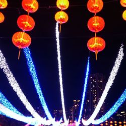 Low angle view of colorful lanterns hanging on ceiling