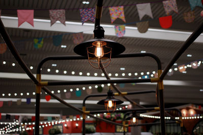 Low angle view of illuminated pendant light