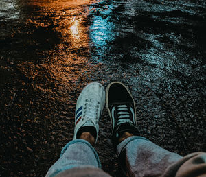 Low section of man legs in water