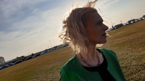 Portrait of young woman looking away