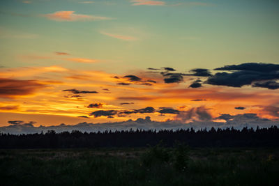 Scenic view of silhouette landscape against sky during sunset