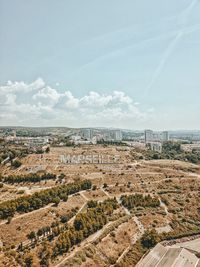 High angle view of buildings against sky