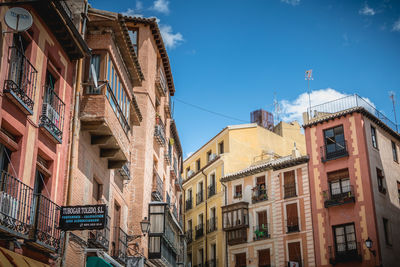 Low angle view of residential buildings against sky