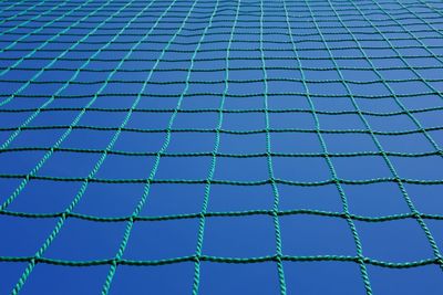 Full frame shot of net against sky