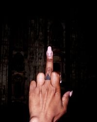 Midsection of person holding umbrella