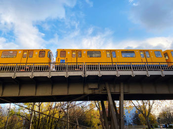 Low angle view of railway bridge against sky