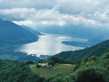 Scenic view of landscape and mountains against sky