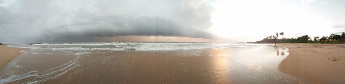 Panoramic view of beach against sky