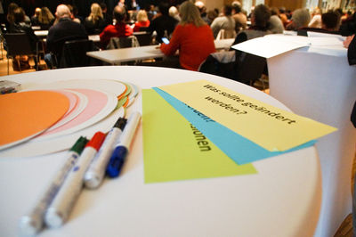 Close-up of people on paper