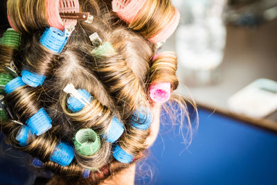 Rear view of woman wearing mask