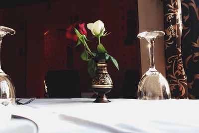 Close-up of vase on table at home