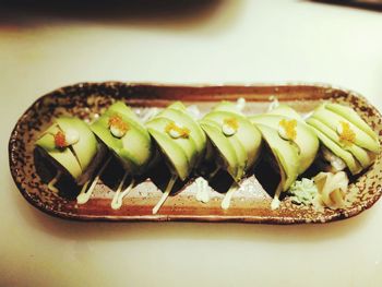 Close-up of vegetables in plate on table