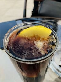 High angle view of coffee in glass on table