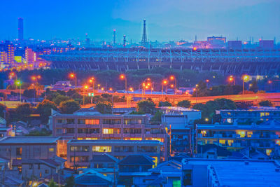 Illuminated buildings in city at night