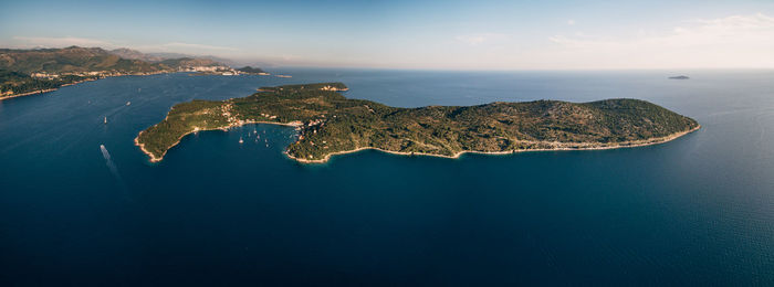 Aerial view of bay against sky