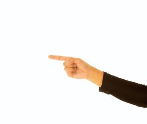 Close-up of human hand against white background