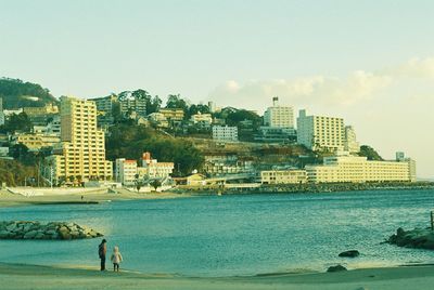 View of cityscape with sea in background