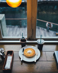 High angle view of coffee cup on table