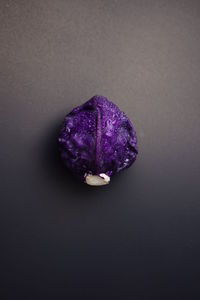 High angle view of purple fruit on table