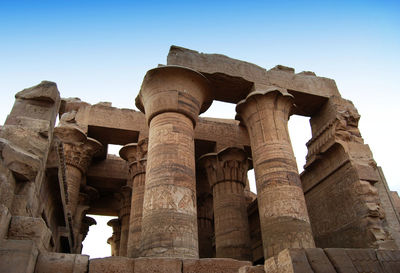 Low angle view of old ruins against clear sky