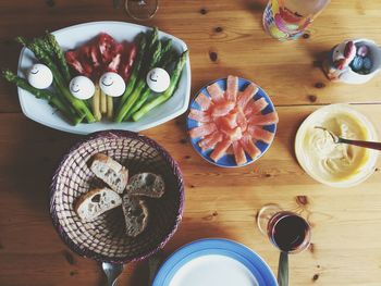 Directly above shot of served foods on table