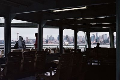 Rear view of people sitting in restaurant
