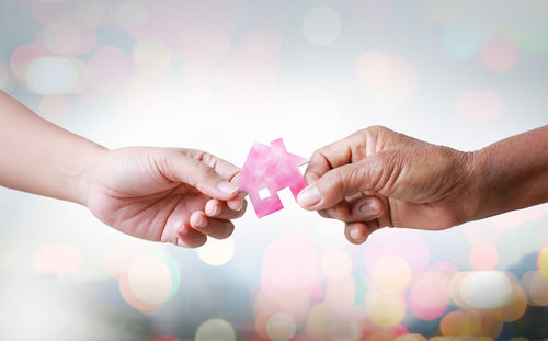 Close-up of hands holding heart shape