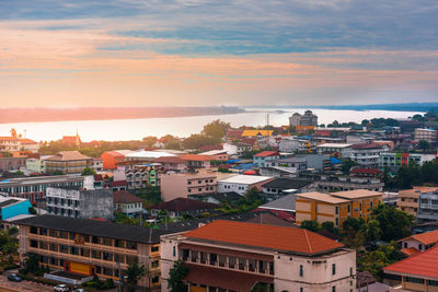 High angle view of buildings in city against sky in mukdahan province, thailand