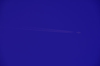 Aerial view of vapor trails in sky