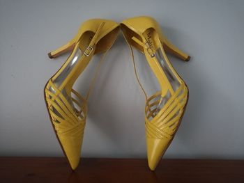 High angle view of shoes hanging on table